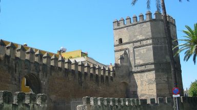 City Walls And The Torre Blanca In The Barrio De La Macarena.